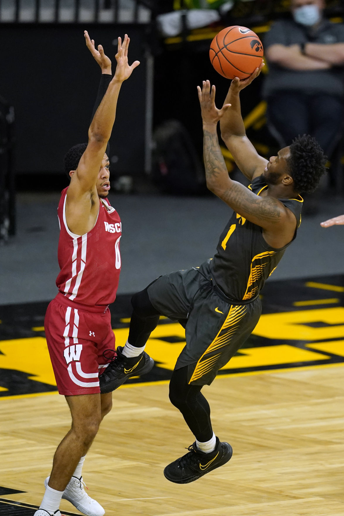 Iowa 77, UW 73